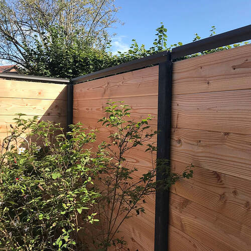 Oscillot® cat-proof fence installed on timber fence